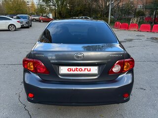 2010 Toyota Corolla X (E140, E150), серый, 910000 рублей, вид 5