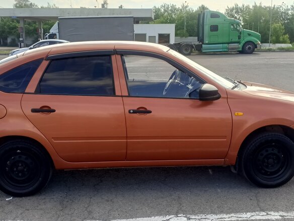 2014 Lada (ВАЗ) Granta I, оранжевый, 450000 рублей - вид 1