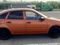 2014 Lada (ВАЗ) Granta I, оранжевый, 450000 рублей - вид 1