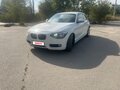 2013 BMW 1 серии 116i II (F20/F21), белый, 870000 рублей - вид 2
