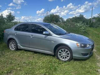 2009 Mitsubishi Lancer X, серебристый, 585000 рублей, вид 4