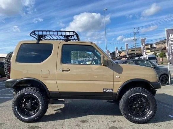 2016 Suzuki Jimny Kei car III Рестайлинг 2, коричневый - вид 1