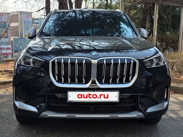 2023 BMW X1 18d sDrive III (U11/U12), чёрный - вид 1