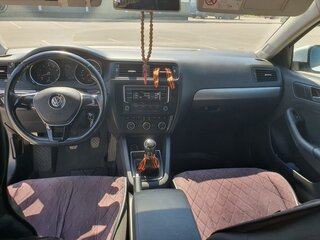 2016 Volkswagen Jetta VI Рестайлинг, белый, 1150000 рублей, вид 3