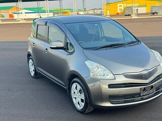 2009 Toyota Ractis I, коричневый, 858000 рублей, вид 5