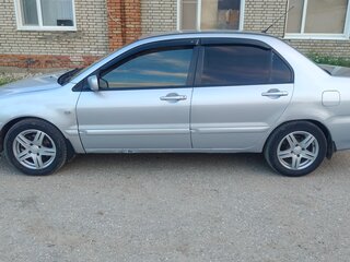 2005 Mitsubishi Lancer IX, серебристый, 370000 рублей, вид 5