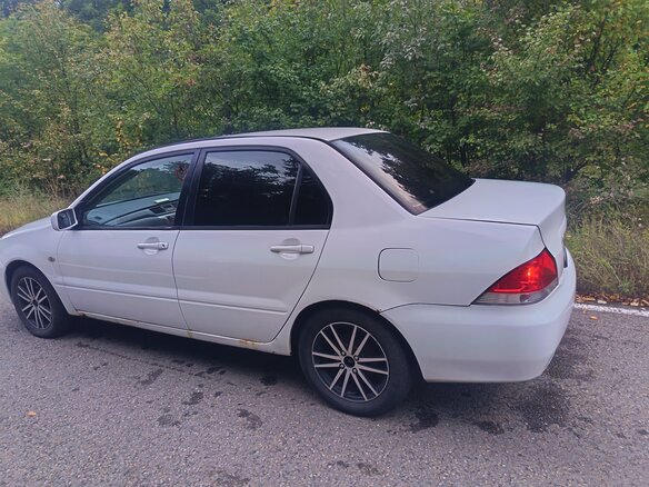 2003 Mitsubishi Lancer Cedia IX, белый, 350000 рублей - вид 13