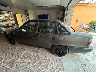 2002 Daewoo Nexia I, коричневый, 700000 рублей, вид 2