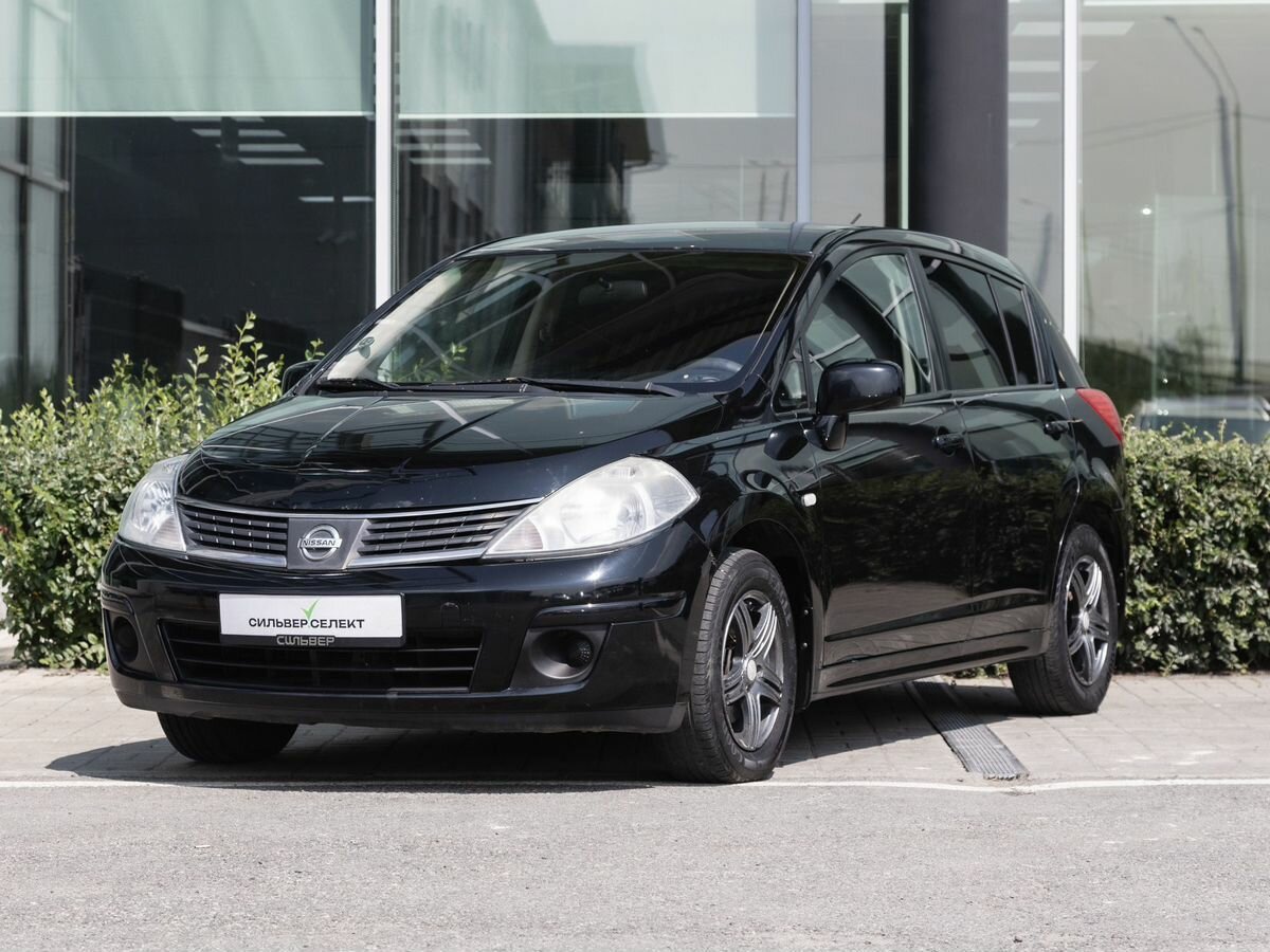 Открыть фотографии: Nissan Tiida I