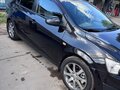2012 Chevrolet Aveo II, чёрный, 660000 рублей - вид 4