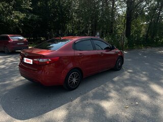 2012 Kia Rio 4-speed III, красный, 655999 рублей, вид 4
