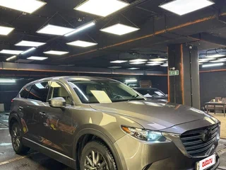 2022 Mazda CX-9 II Рестайлинг, серебристый, 2900000 рублей, вид 3