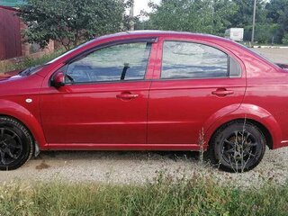 2011 Chevrolet Aveo I Рестайлинг, красный, 410000 рублей, вид 4