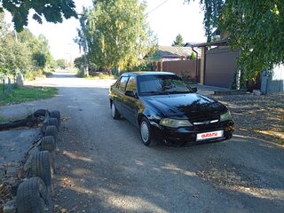 2012 Daewoo Nexia I Рестайлинг, чёрный, 128000 рублей, вид 1