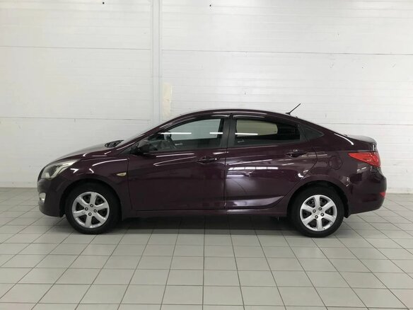 2014 Hyundai Solaris I, фиолетовый, 940000 рублей - вид 9