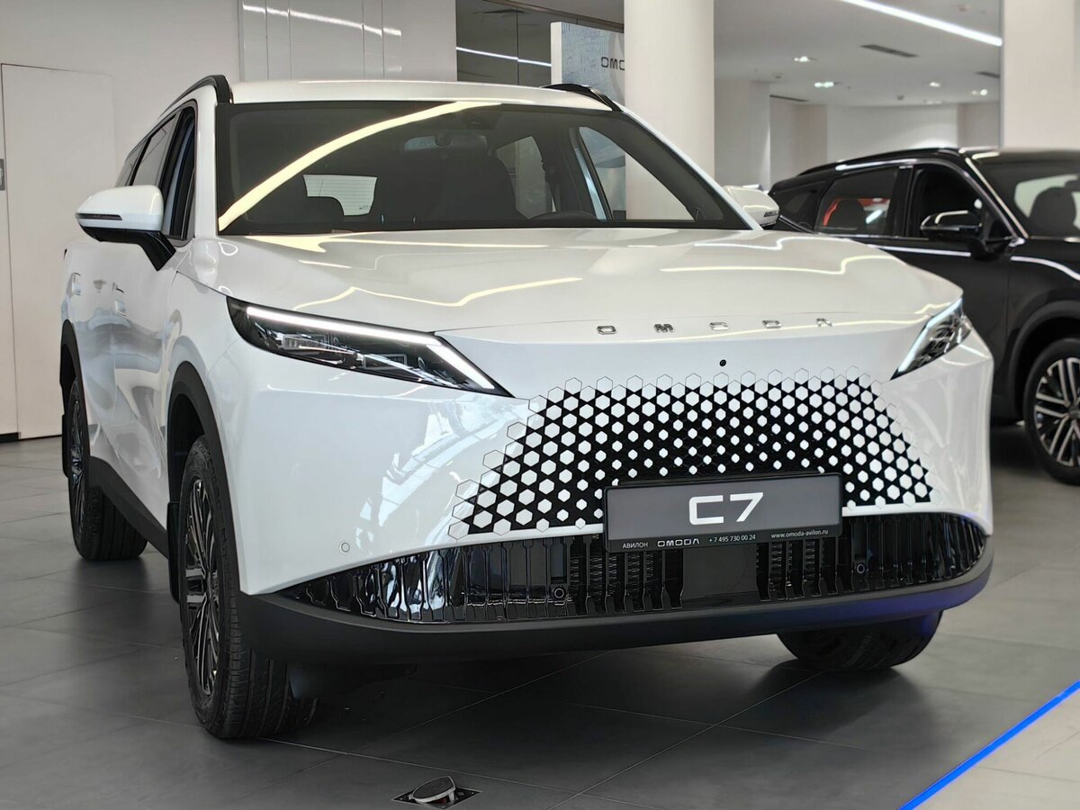 Открыть фотографии: Omoda C7