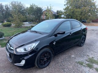 2011 Hyundai Solaris I, чёрный, 850000 рублей, вид 4