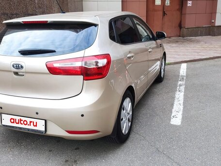 2012 Kia Rio 4-speed III, бежевый, вид 3