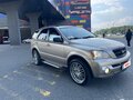 2006 Kia Sorento 5-speed I, золотистый