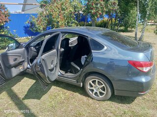 2013 Nissan Almera III (G15), синий, 650000 рублей, вид 5