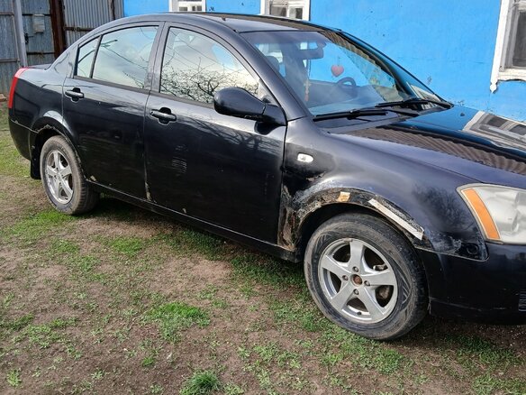 2011 Vortex Estina I, чёрный, 245000 рублей - вид 1
