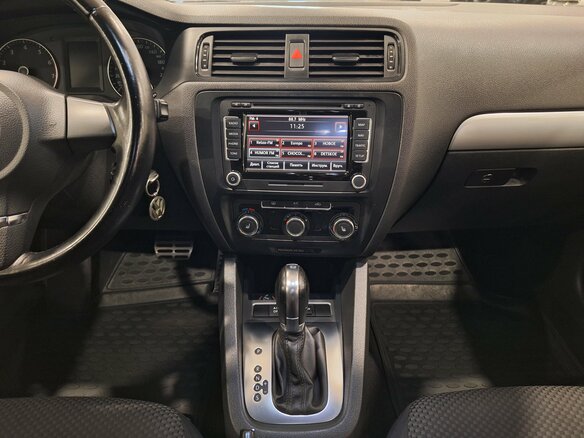 2012 Volkswagen Jetta VI, синий, 1150000 рублей - вид 10