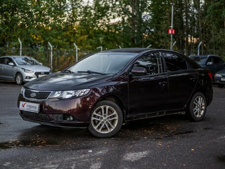 2011 Kia Cerato 6-speed II, красный, 525000 рублей, вид 1