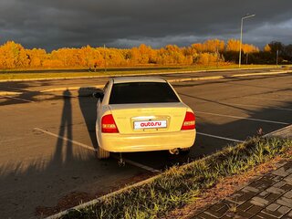 2002 Mazda Familia VIII (BJ), белый, 170000 рублей, вид 5