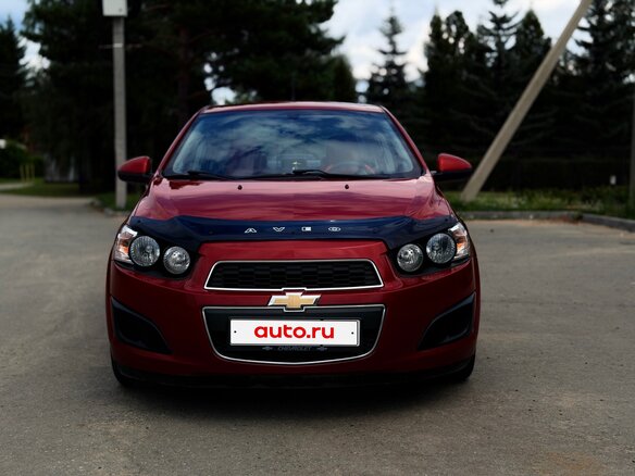 2012 Chevrolet Aveo II, красный, 730000 рублей