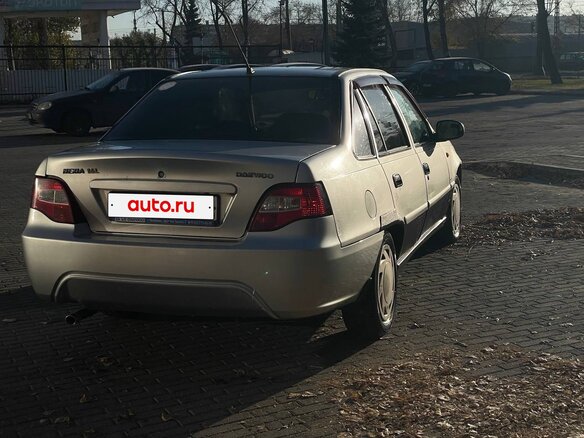 2010 Daewoo Nexia I Рестайлинг, серебристый, 120000 рублей - вид 2