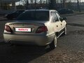 2010 Daewoo Nexia I Рестайлинг, серебристый, 120000 рублей - вид 2