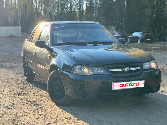 2012 Daewoo Nexia I Рестайлинг, чёрный, 124990 рублей