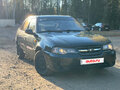 2012 Daewoo Nexia I Рестайлинг, чёрный, 124990 рублей
