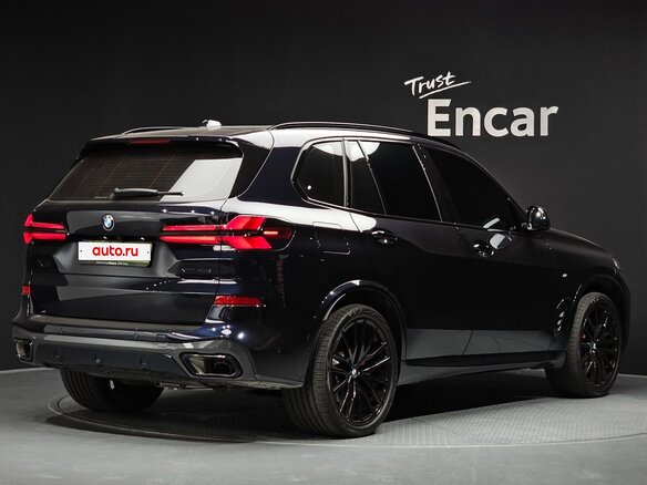 2025 BMW X5 40d IV (G05/G18) Рестайлинг, чёрный, 12459069 рублей - вид 1