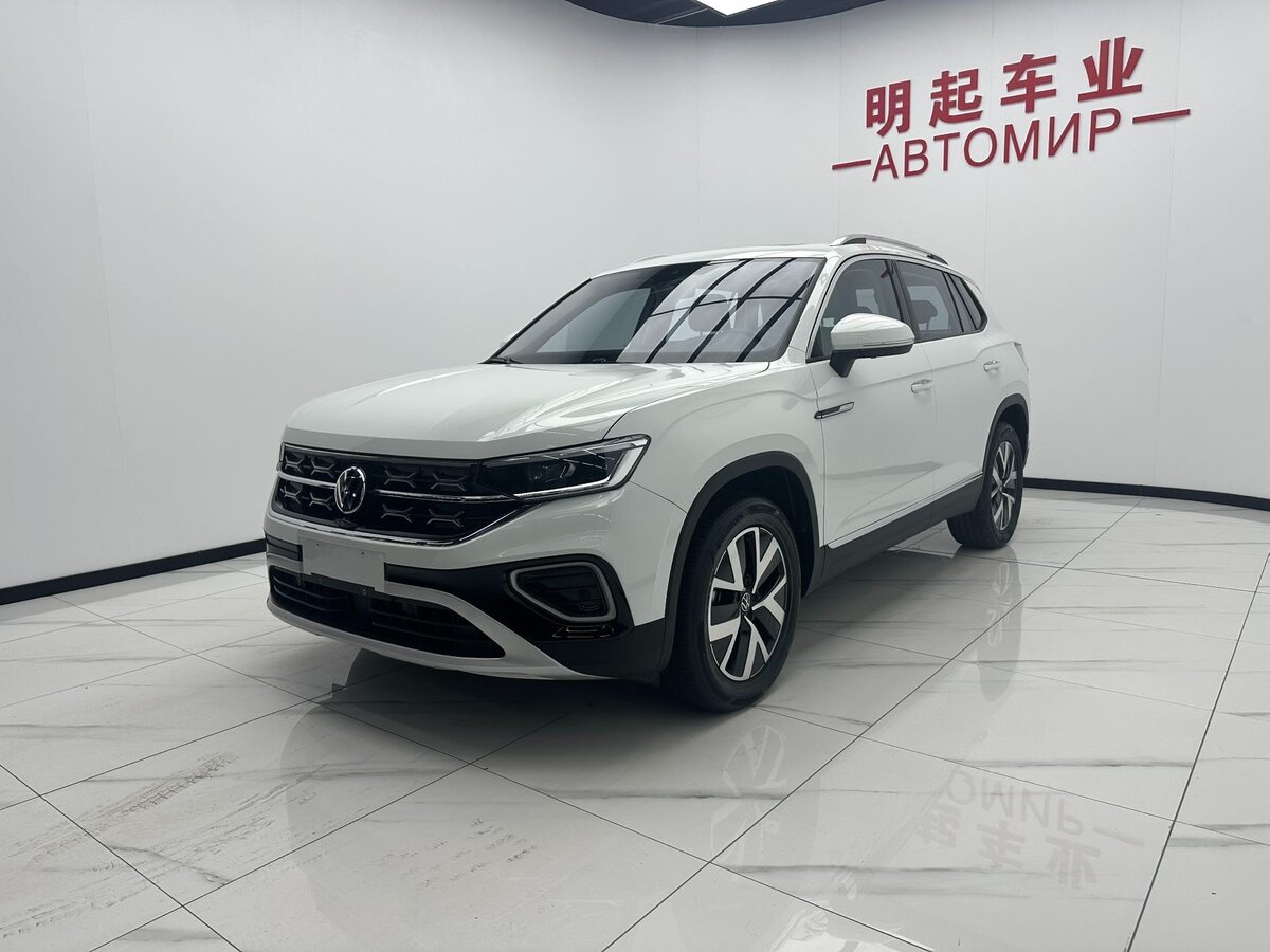 Открыть фотографии: Volkswagen Tayron I Рестайлинг