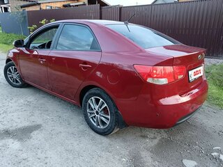 2010 Kia Cerato 5-speed II, красный, 529000 рублей, вид 5