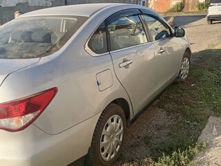 2014 Nissan Almera III (G15), серебристый, 650000 рублей, вид 2