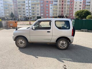 2013 Suzuki Jimny Kei car III Рестайлинг 2, серебристый, 1300000 рублей, вид 4