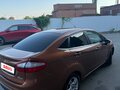 2015 Ford Fiesta Mk6 Рестайлинг, коричневый, 700000 рублей - вид 2