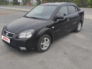 2011 Kia Rio II Рестайлинг, чёрный, 580000 рублей, вид 1