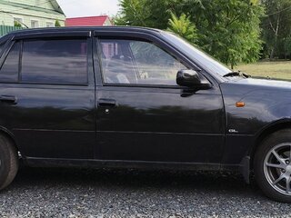2010 Daewoo Nexia I Рестайлинг, чёрный, 250000 рублей, вид 2