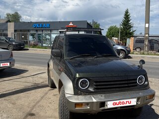 1995 Mitsubishi Pajero Junior, зелёный, 300000 рублей, вид 1