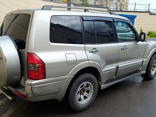 2003 Mitsubishi Montero III, серый, 645000 рублей, вид 5