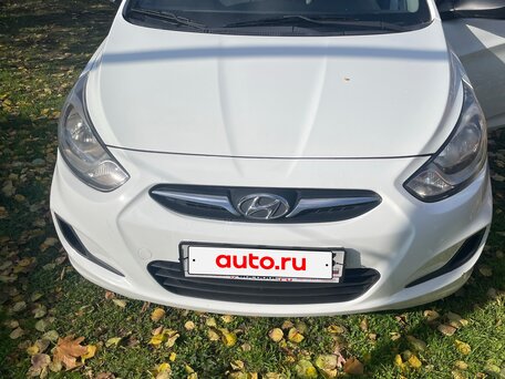 2014 Hyundai Solaris I, белый, 750000 рублей, вид 2
