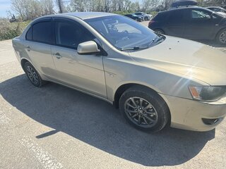 2010 Mitsubishi Lancer X, бежевый, 630000 рублей, вид 2