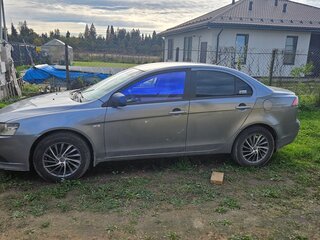 2012 Mitsubishi Lancer X Рестайлинг, серебристый, 650000 рублей, вид 4