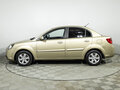 2011 Kia Rio II Рестайлинг, бежевый, 599700 рублей - вид 7