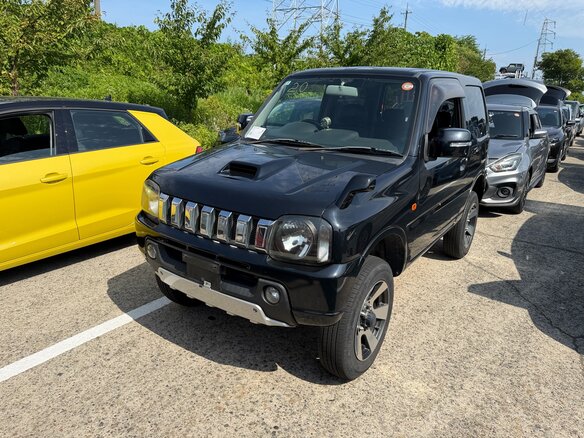 2010 Suzuki Jimny Kei car III Рестайлинг 1, чёрный - вид 4