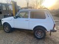 2014 Lada (ВАЗ) 2121 (4x4) I Рестайлинг, белый, 550000 рублей - вид 2