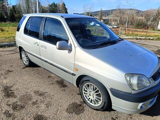 2001 Toyota Raum I, серый, 430000 рублей, вид 2